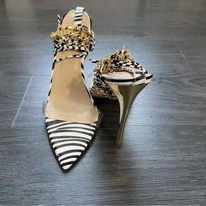 Zebra print open toe strap heel with gold chain. Size 9